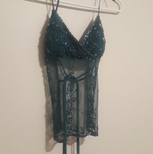 Turquoise sequins, sheer blouse